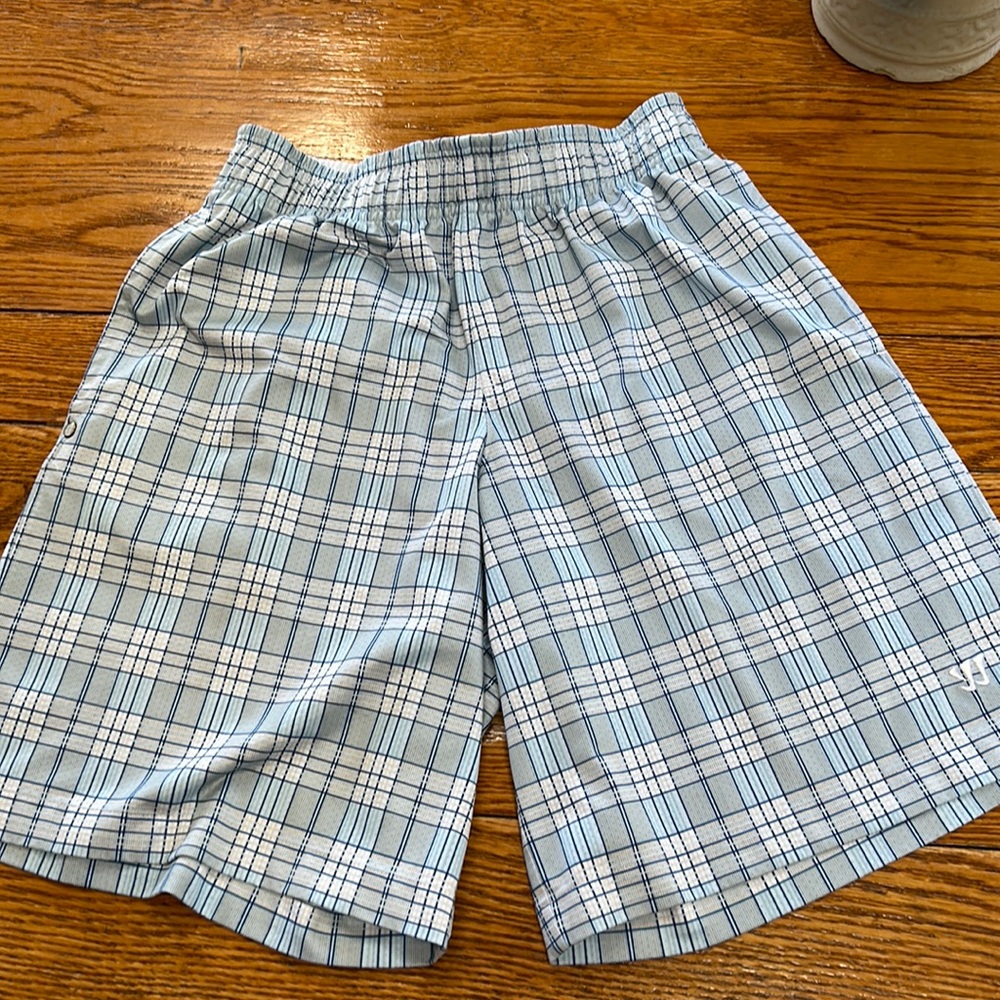 Warrior brand blue plaid men’s athletic shorts.  Size Small.